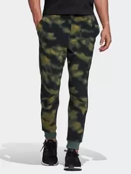 Image of adidas Polar Fleece Nature Print Joggers, Green Size M Men