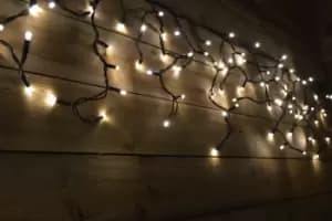 Image of 300 LED (6m) Warm White Connectable Icicle Lights on a Black Cable