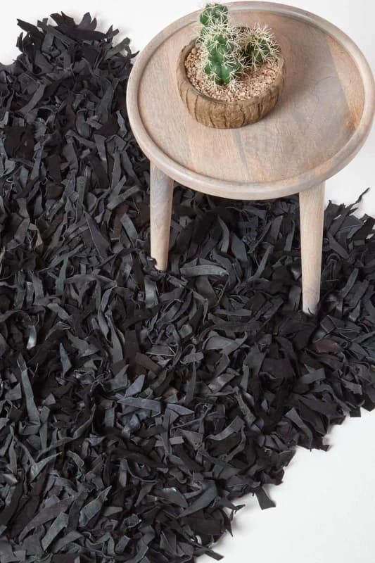 Image of Homescapes Dallas Leather Shaggy Rug in Black Size: 120cm x 180cm Black Unisex 120cm x 180 cm