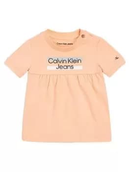 Image of Calvin Klein Jeans Baby Hero Logo Short Sleeve Dress - Fresh Cantaloupe, Light Orange, Size 12-18 Months