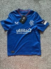 Image of RANGERS KIDS CASTORE HOME SHIRT , VARIOUS AGES .................... BNWT