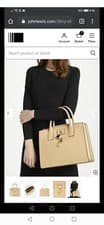 Image of Bnwt original DKNY elegant tote handbag with charms, original packaging, rrp259