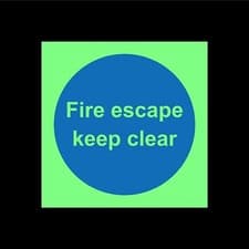 Image of Fire escape keep clear - Photoluminescent safety sign