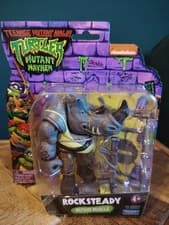 Image of Teenage Mutant Ninja Turtles Mutant Mayhem - Rocksteady Figure New
