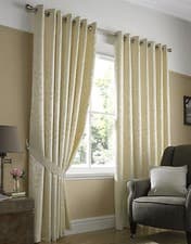 Image of Tivoli Cream Ring top Eyelet Curtains including Tie Backs