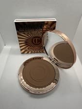 Image of Charlotte Tilbury Beautiful Skin Sun-Kissed Glow Bronzer Fair Shade 1