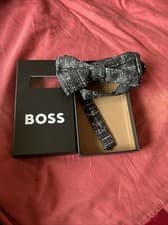 Image of hugo boss bow tie black with white Markings/dot Pattern