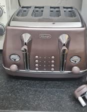Image of DeLonghi Icona Metallics 4 Slice Toaster Rose Gold CTO Series With Box