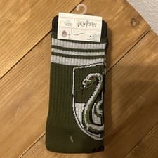 Image of Harry Potter Slytherin House knee-high socks.