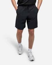 Image of Nike Shorts Dri-FIT Unlimited Men's 7 Unlined Woven Fitness Shorts running black
