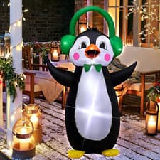 Image of 4Ft Christmasin Inflatable Penguin: Christmas Inflatable Green Headset Penguin w