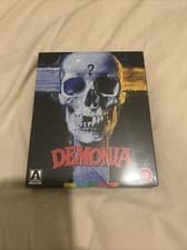 Image of ARROW LUCIO FULCI DEMONIA / FULCI TALKS LIMITED CRUCIFIX PACKAGING BLU-RAY SET
