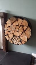 Image of Handmade bespoke wall mounted round cylindrical log holder with kindling store