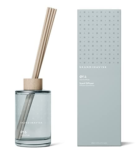 Image of Skandinavisk ØY 'Island' Reed Diffuser with 8 Reeds. Lasts +3 Months. Fragrance Notes: Crabapple and Dog Rose, Water Mosses and Green Leaves. 200 ml