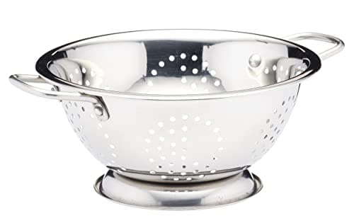 Image of KitchenCraft Footed Stainless Steel Colander with Riveted Double Handles, Large Draining Holes for Pasta, Vegetables, Dishwasher Safe, Silver, 24.5 cm