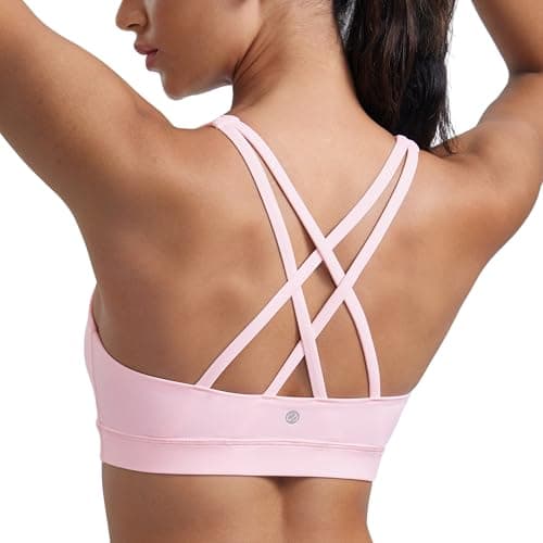 Image of CRZ YOGA Women's Strappy Back Sports Bra - Mid Impact Wirefree Padded Workout Yoga Crop Top Strawberry Pink S