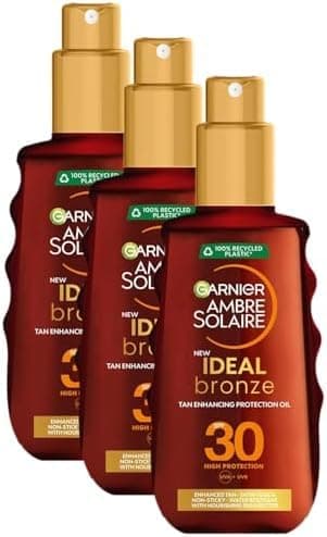 Image of Garnier Ambre Solaire Ideal Bronze Protective Oil Sun Cream Spray SPF30, High Sun Protection Factor 30, Shea Butter, Water Resistant & Non Greasy Sunscreen, UVA & UVB Protection, 150ml (Pack of 3)