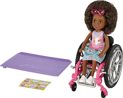 Image of Barbie Chelsea Doll & Wheelchair with Moving Wheels, Ramp, Sticker Sheet & Accessories, Small Doll with Curly Brown Hair