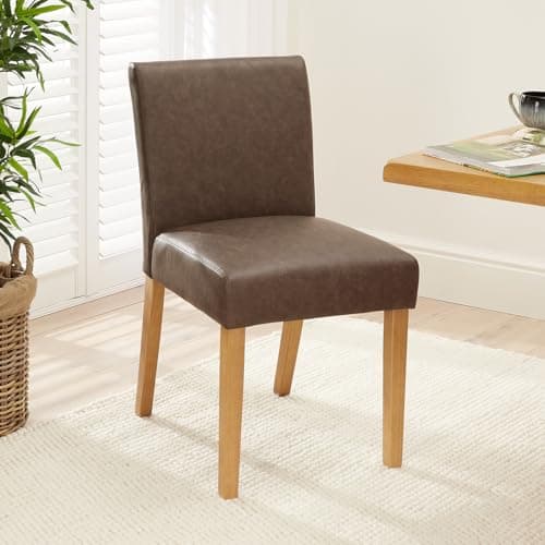 Image of Monty Vintage Brown Faux Leather Dining Chair | Natural Oak Hardwood Legs | Modern Minimalist Design | Cushioned Seat | Minor Assembly Required | H 845mm x W 470mm x D 590mm