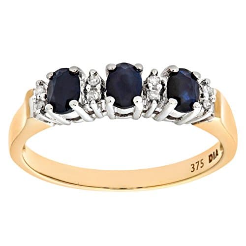 Image of Naava Women's 9 ct Yellow Gold Claw Set Diamond and Sapphire Eternity Ring, Size R