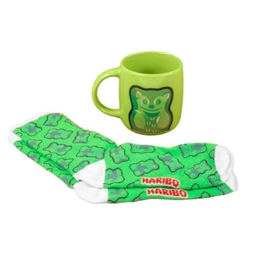 Image of Haribo Green Bear Mug & Sock Gift Set. Features Haribo Starmix Green Bear Design. 460ml Capacity Mug. One size fits most Socks. Officially Licensed Haribo Merchandise.