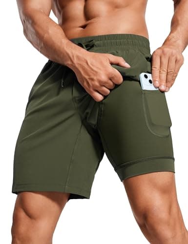 Image of CRZ YOGA Men's Quick Dry Sports Shorts - 7 Inches Workout Lightweight 2 in 1 Running Gym Athletic Shorts with Pockets Dark Olive L