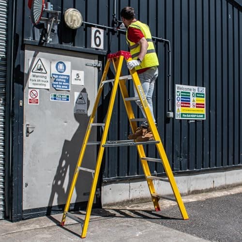 Image of Trade Master Pro® Fibreglass Swingback Step Ladder | Electricians Ladder | Non Conductive up to 30,000V | Non-Slip Feet | Painting & Decorating | EN131 Pro Certified | 1.09m Height | 4 Steps