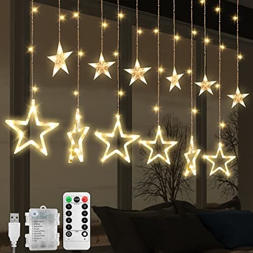 Image of Jsdoin Christmas LED Stars Curtain Lights,12 Stars 138 Window Curtain String Lights with 8 Flashing Modes Decoration for Wedding, Party,Wall, Home Decorations,USB/Battery Powered (Warm White)