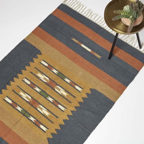 Image of HOMESCAPES Orange & Blue Handwoven Kilim Rug 90 x 150 cm Jute & Cotton Living Room Area Rug ‘Lundi’ with Traditional Geometric Pattern & Tassels