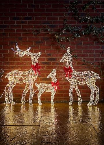 Image of Marco Paul Pre-Lit Reindeer Family Outdoor Christmas Decorations - 3-Piece Light-Up Reindeer Set with 750 Warm White LEDs, Indoor & Outdoor Stag Ornaments, Metal Frame & Red Bows for Xmas Garden Decor