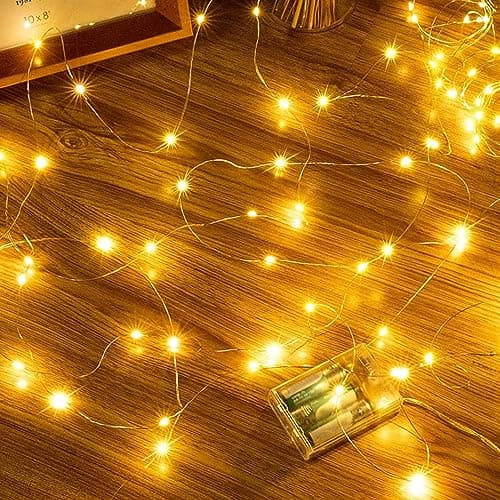 Image of Ollny 5m 50 LED Fairy Lights Battery Operated, Bright Waterproof Copper Wire Christmas Lights for Indoor Outdoor Lighting, Christmas Tree Bedroom Outside Party Bottle Wedding Decorations (Warm White)