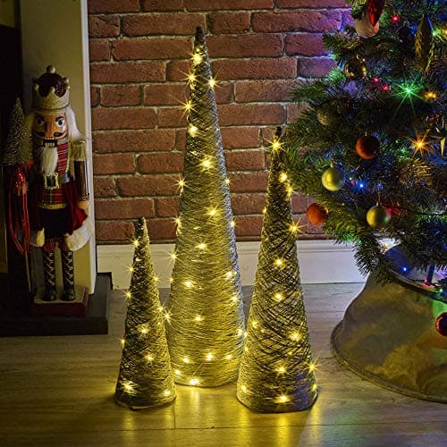 Image of URBNLIVING 3 Pcs Light Up LED Christmas Tree Cones, Xmas Cone Pyramids with LED Fairy Light Strings for Home Decor Window Display, 40-80cm Tall, 3 x AA Batteries (Silver with Glitter)