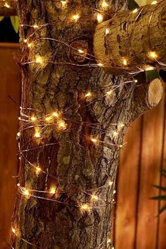 Image of Solarize ® 100/200/300 LED Copper Wire Solar Rice String Light, Wrap Around Trees, Plants, Mirrors Home & Garden Decoration (200 LED Copper Wire Solar, White)